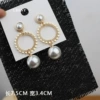 Round hollow pearl earrings