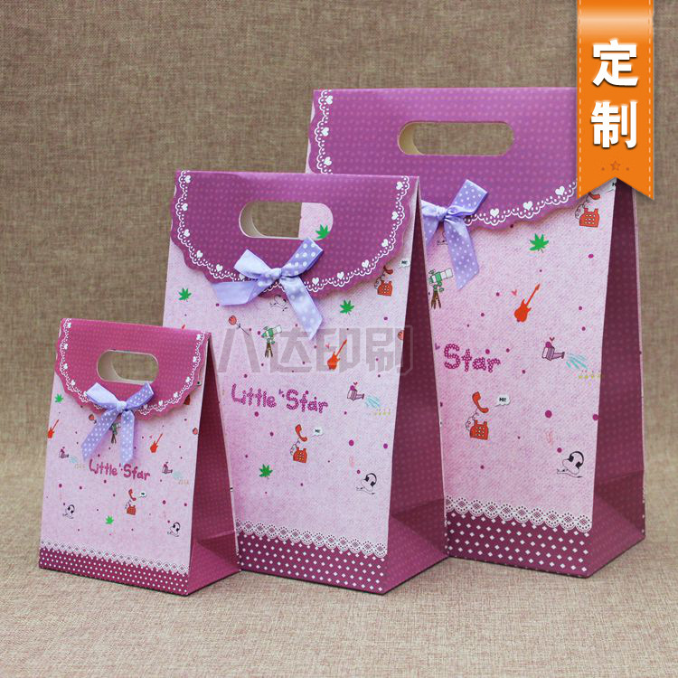 【精品推荐】厂家定做大中小号礼物袋翻盖粘抠卡通礼品包装袋批发