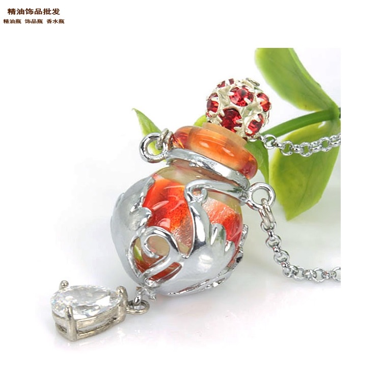 中国精油饰品网幻彩枣红瓶流星花园项链吊坠3.jpg