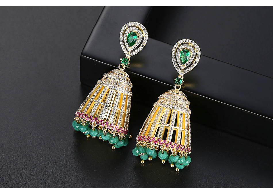 Nihaojewelry Fashion Hollow Bell Women's Copper Inlaid Zircon Stud Earrings Tassel Earrings display picture 4
