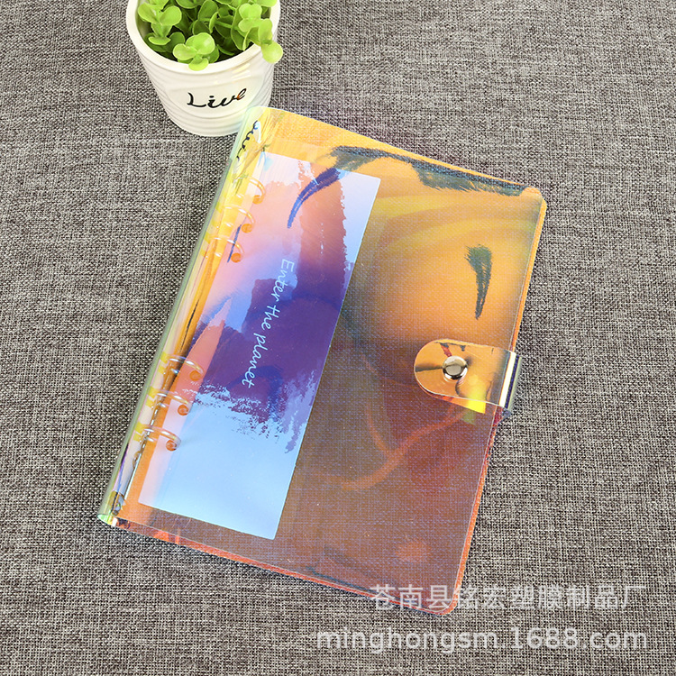 Venta al por mayor láser colorido botón transparente de hojas sueltas carpeta Shell A5A6A7 6-agujero de hojas sueltas cuaderno portátil