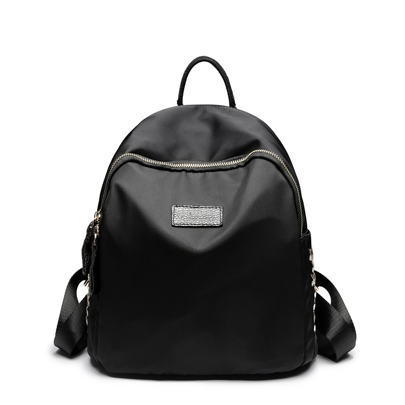 新款防水時尚學生書包韓版背減負牛津布雙肩包複古學院風旅行背包