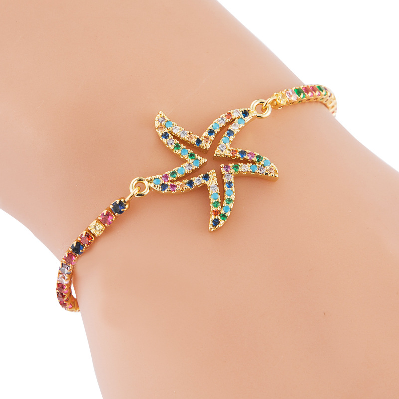 Female Copper Adjustable Creative Hollow Starfish Rainbow Inlaid Zircon Bracelet display picture 2