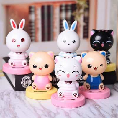 solar doll car ornaments cartoon – Car ornaments