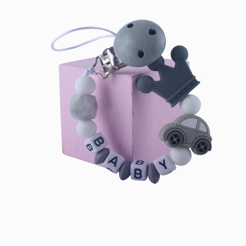 Patrón de dibujos animados de bebé de silicona chupete Cadena de dientes de bebé Cadena de molienda chupete cadena anti-caída comercio exterior