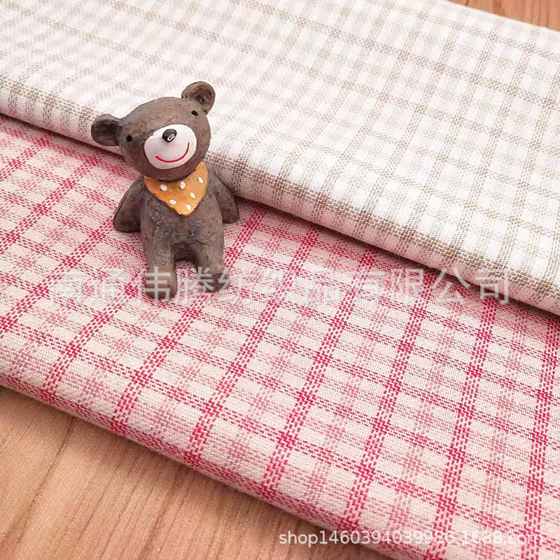 厂家直销春夏新款梭织全棉格子布春夏季衬衫服装面料现货供应