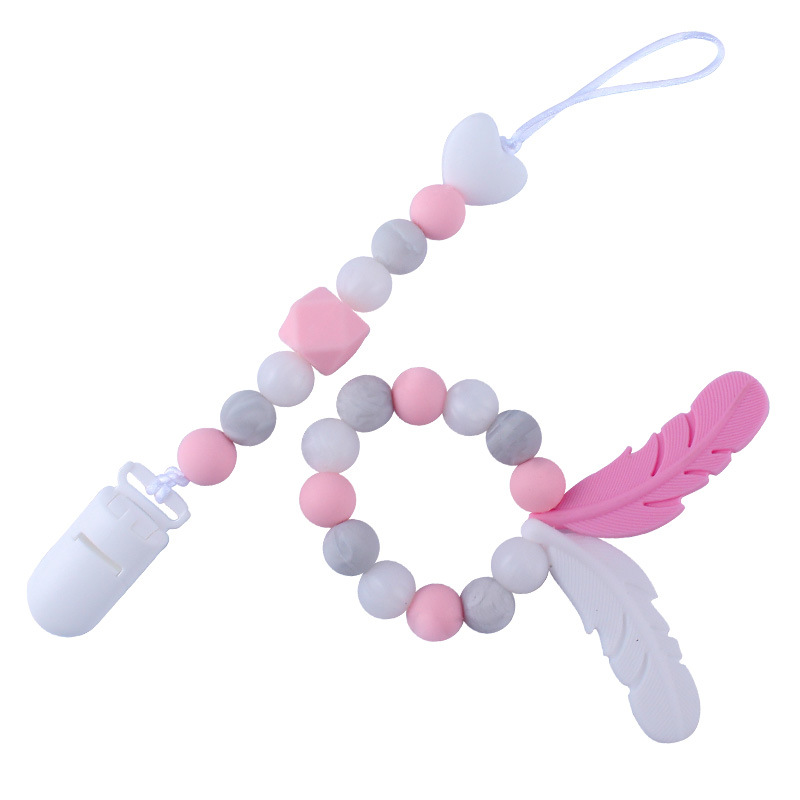 Productos para bebés de silicona chupete cadena mordedor pluma de dibujos animados de silicona juguete dientes molienda teether traje