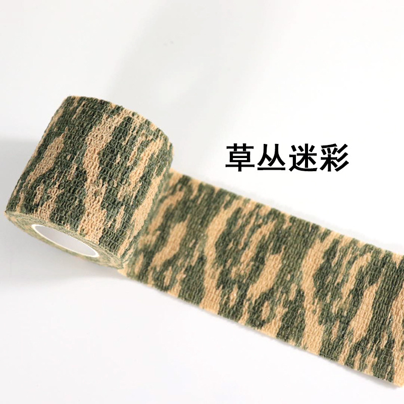Fábrica sin pegamento cinta de camuflaje telescópica autoadhesiva tela no tejida caza al aire libre caza camuflaje cinta de montar