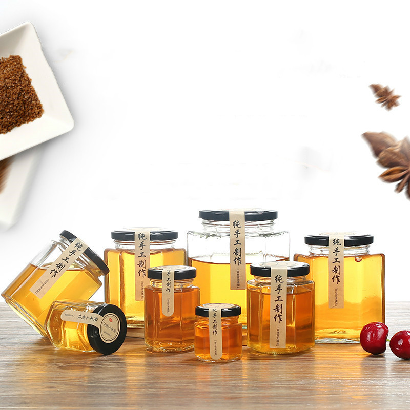 批发六棱蜂蜜瓶蜂蜜包装玻璃瓶 透明酱菜瓶 密封果酱罐子一斤两斤