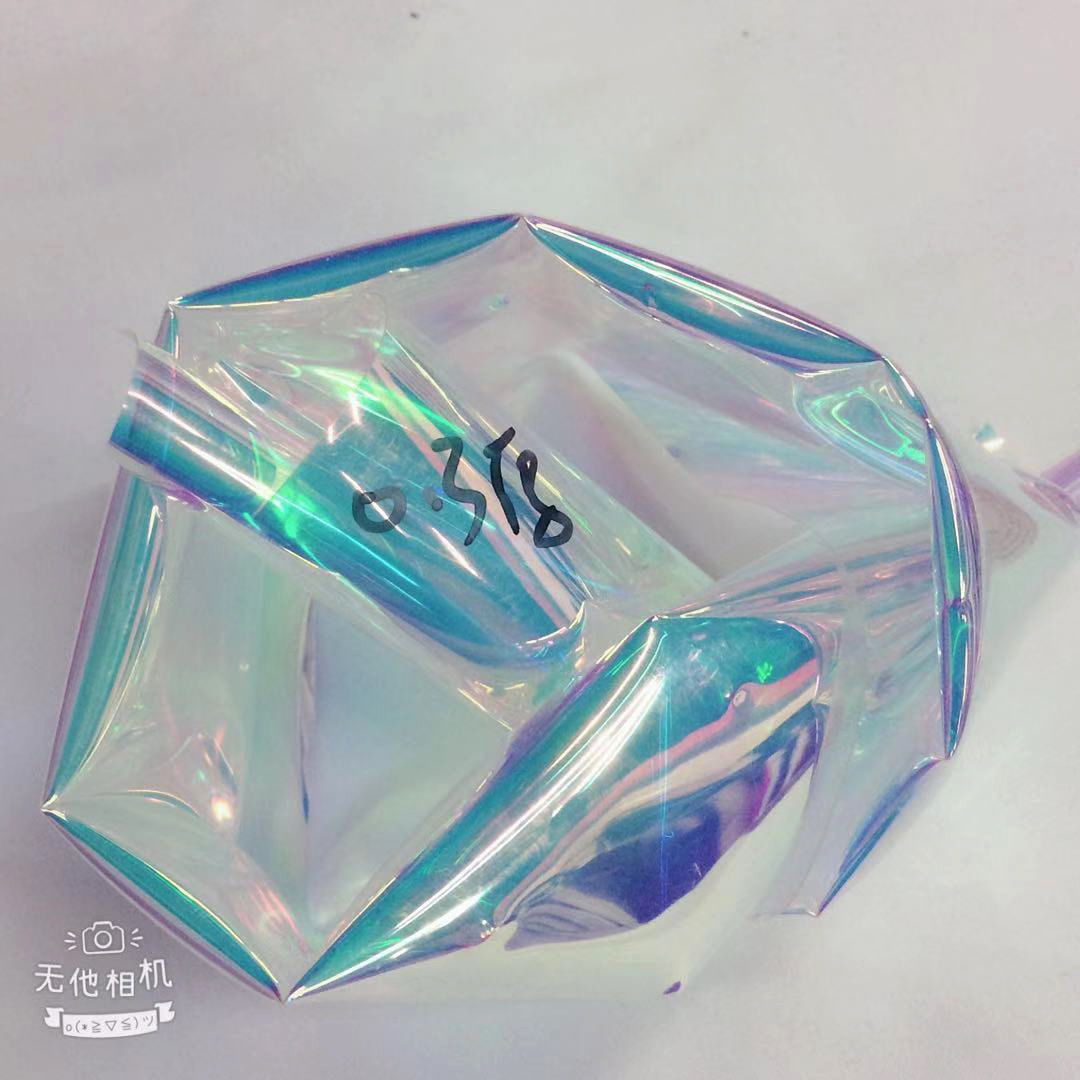 tpu镭射幻彩皮革玩具包果冻包化妆盒小提包手机套透明七彩pvc皮革