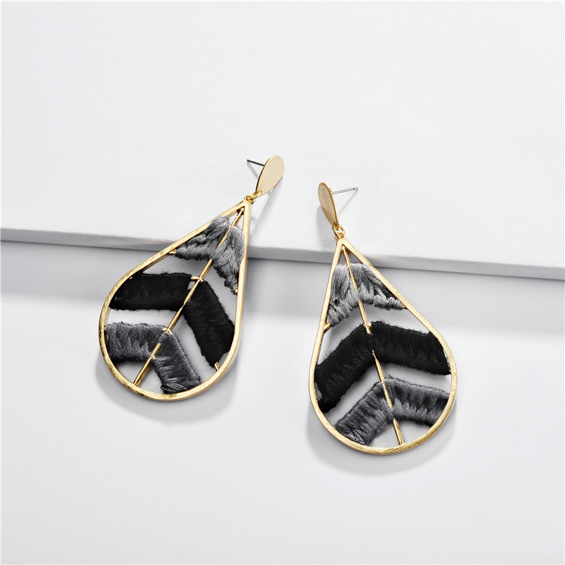 Jewelry Earrings Alloy Color Cotton Woven Hollow Leaves Female Earrings display picture 2