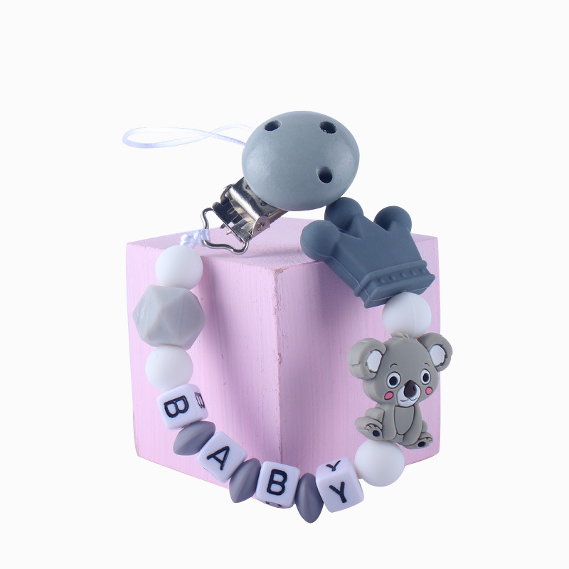 Patrón de dibujos animados de bebé de silicona chupete Cadena de dientes de bebé Cadena de molienda chupete cadena anti-caída comercio exterior