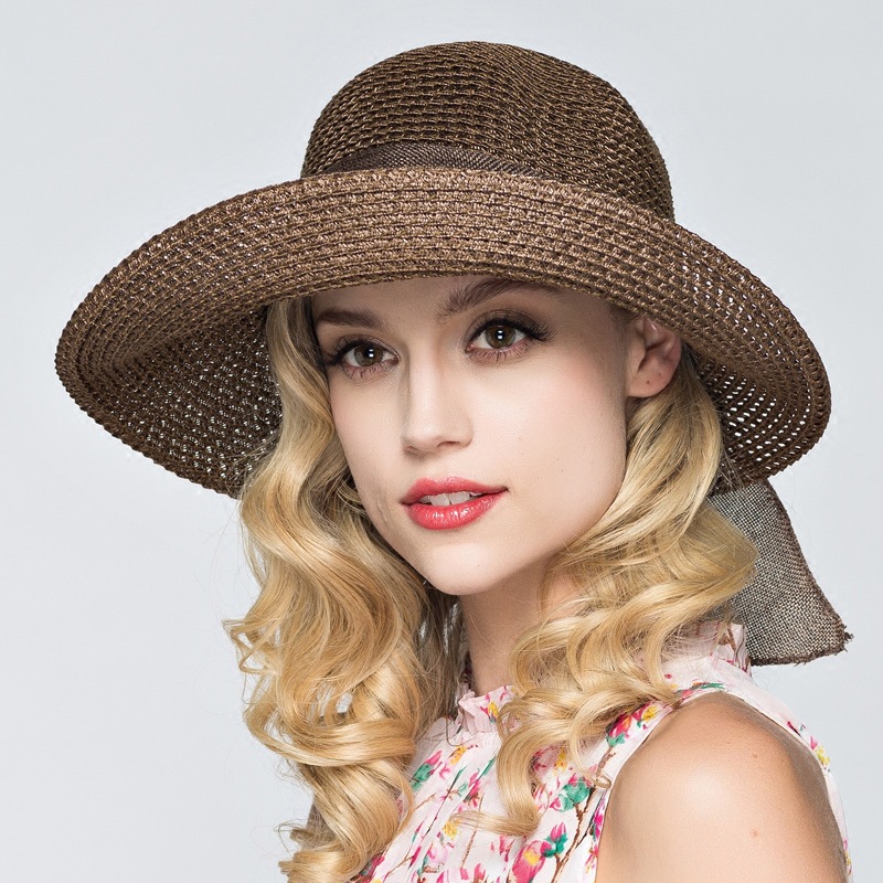 Women's Basic Solid Color Bowknot Crimping Straw Hat display picture 4