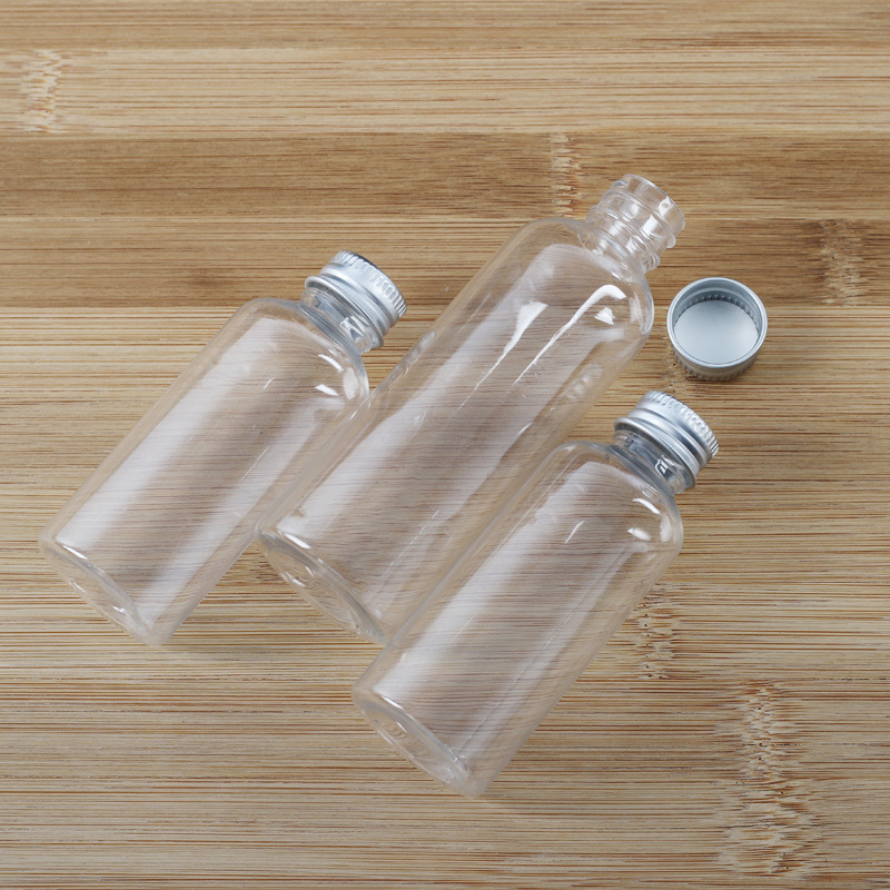 Tapa de aluminio transparente botella de plástico ordinario tapa de tornillo de plástico botella de loción de agua cosmética sub-botella de plástico pequeña botella vacía