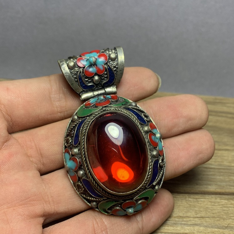 Antique copper pendant with zircon