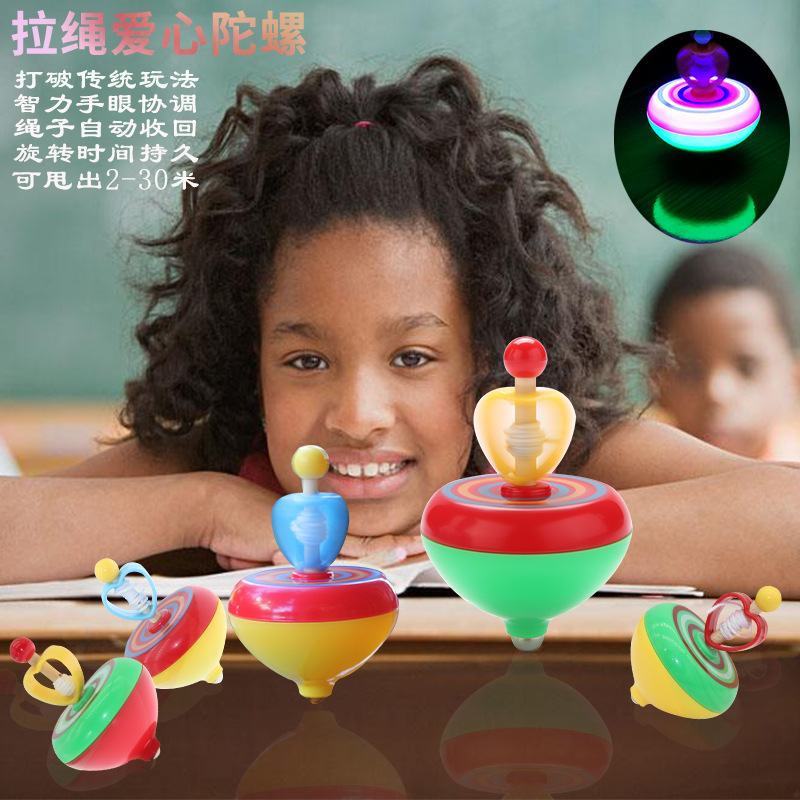 Spinning top with cord