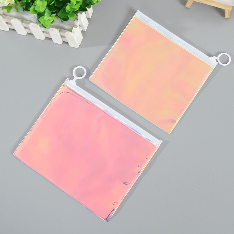 幻彩PVC拉链袋定 做镭射炫彩化妆品包装袋子可挂式拉头包装袋批发