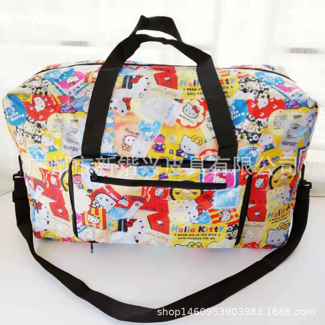 布丁犬玉桂犬美楽蒂k.t防水アニメ携帯折りたたみ旅行バッグはスーツケースに固定できます。