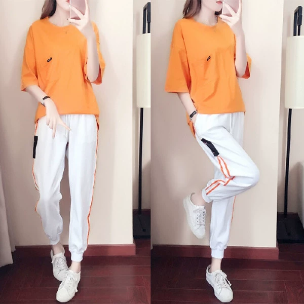 Оптовая продажа летних гаремных брюк спортивный костюм женский 2023 Новая мода свободная одежда для бега с короткими рукавами Повседневный комплект из двух предметов