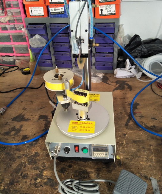 变压器外围胶布包胶包胶机变压器磁环线圈外围胶带机半自动包胶机