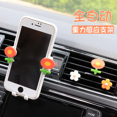 Car creative cute mobile phone bracket outlet clip-on universal navigation gravity bracket Panya wind bracket