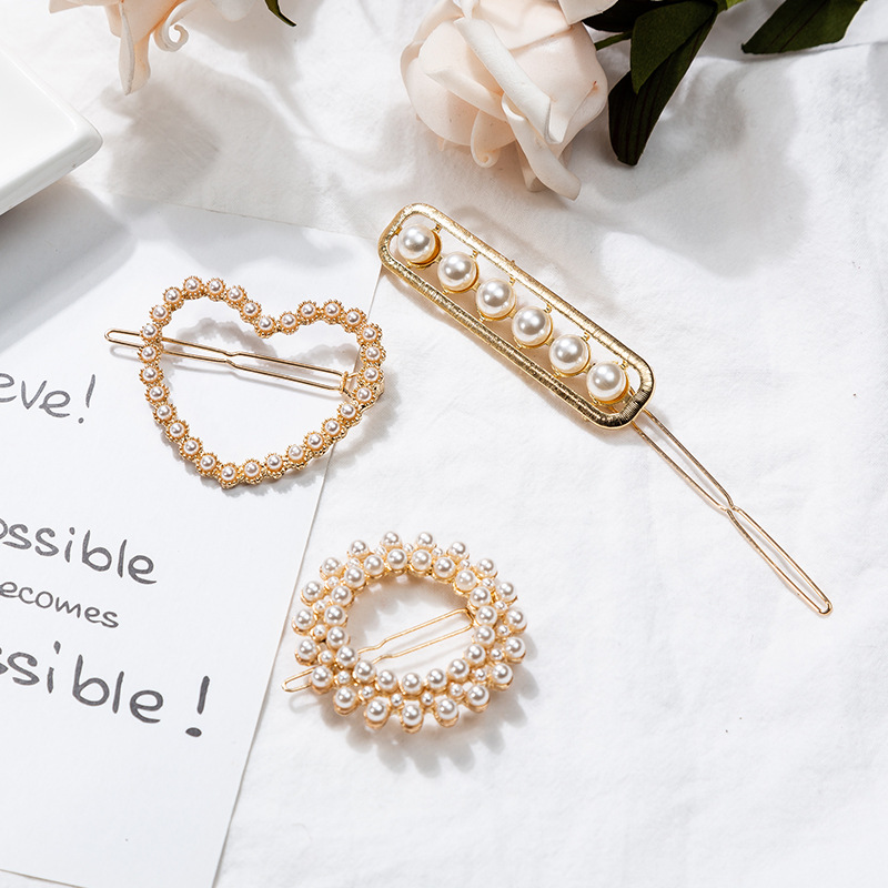 the republic of korea ins Simplicity Hollow Pearl Hairpin love Versatile Retro Net Red Same item Card issuance Edge clamp Liuhaijia