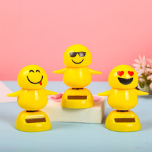 创意摇头公仔卡通车载表情包太阳能汽车摆件车内装饰饰品厂家直销