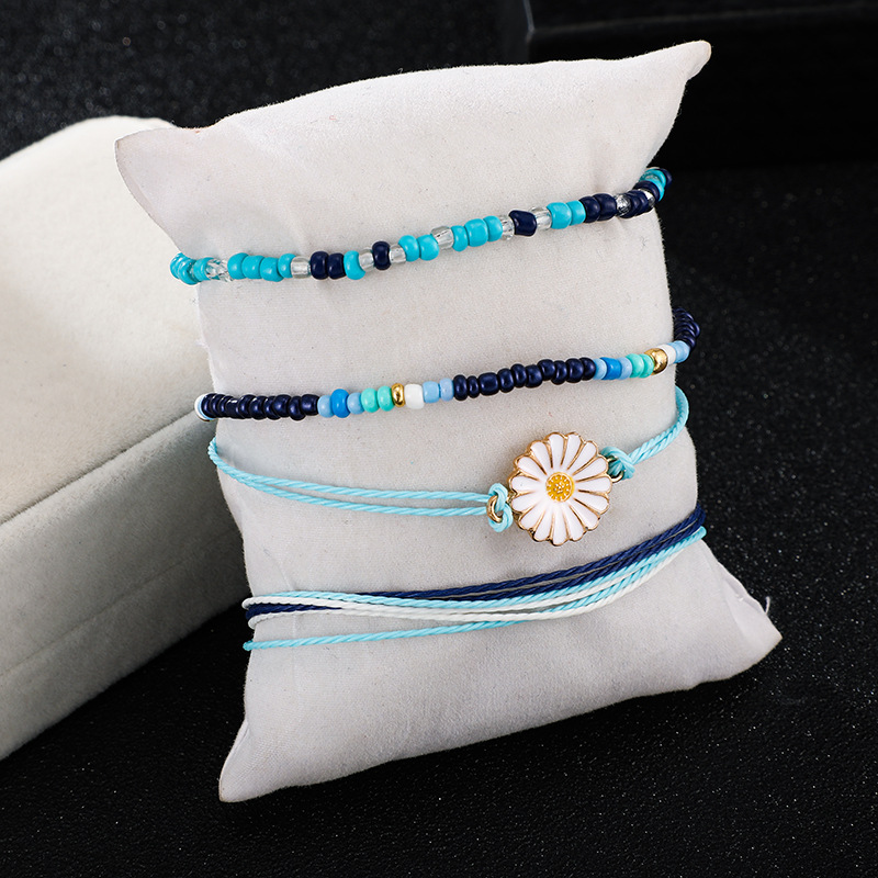 Europäische Und Amerikanische Grenz Überschreitende Neue Hand Gewebte Schnur Farbe Reis Perlen Blumen Armband Gänseblümchen Schnur Armband 4-teiliges Set display picture 2