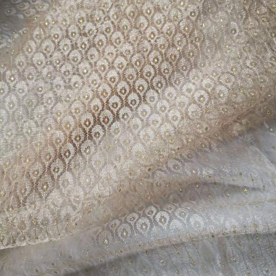 【厂家直销】薄透无弹轻盈透薄锦纶金线凤羽提花网布 裙装等面料