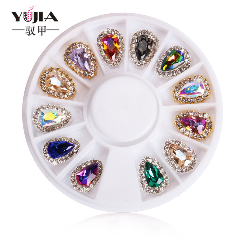 Joyería de uñas de lujo exclusiva transfronteriza al por mayor de aleación de escudo mágico colorido diamante joyería de uñas grande placa giratoria