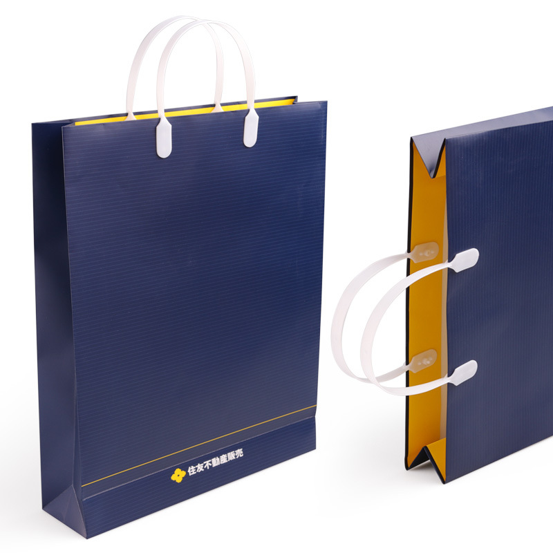 厂家潘通专色印刷房地产纸袋小批量高级塑料手提袋蓝色购物服装袋