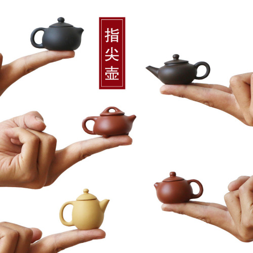 Mini purple clay pot handmade creative small pocket fingertip pot small tea play tea pet ornaments Kung Fu tea set can be raised