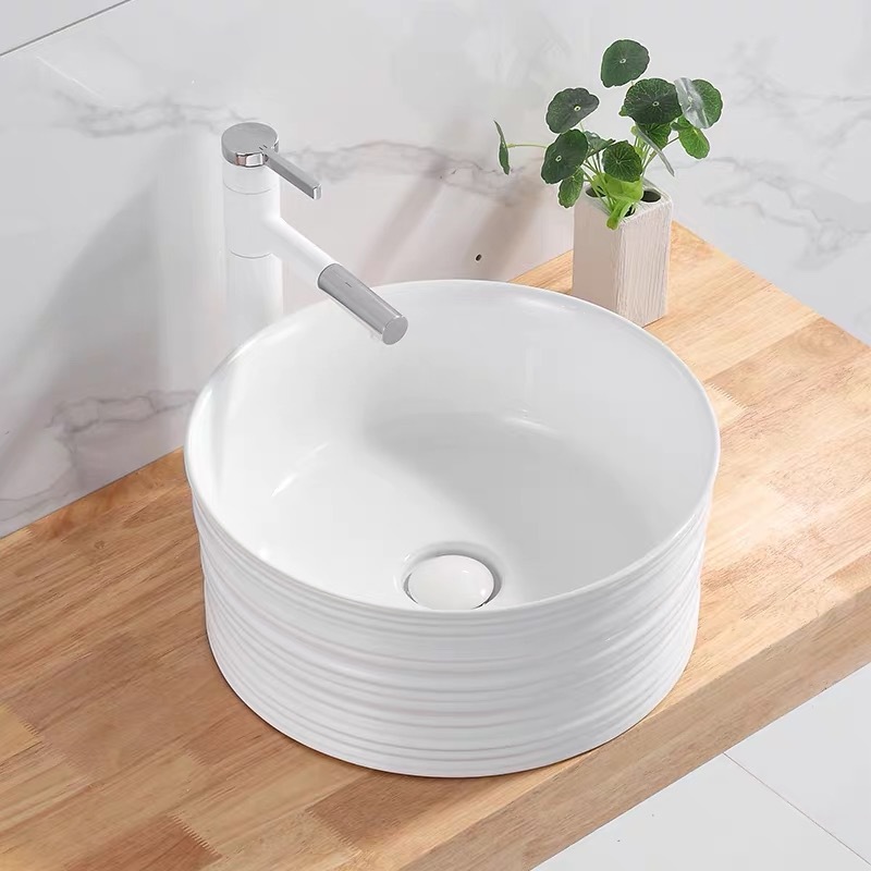 Nuevo simple europeo alivio arte Cuenca del lavabo redondo lavabo profundo lavabo de cerámica lavabo personalidad creativa lavabo