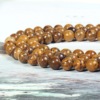 Manufacturer directly provides natural elephant stone gold silk soft jade round beads wholesale cross -border Goldenlaceagate