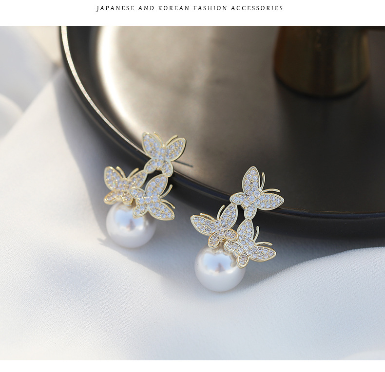 Sterling Silver Pearl Butterfly Exaggerated Fashion Large Earrings Long Stud Earrings display picture 8