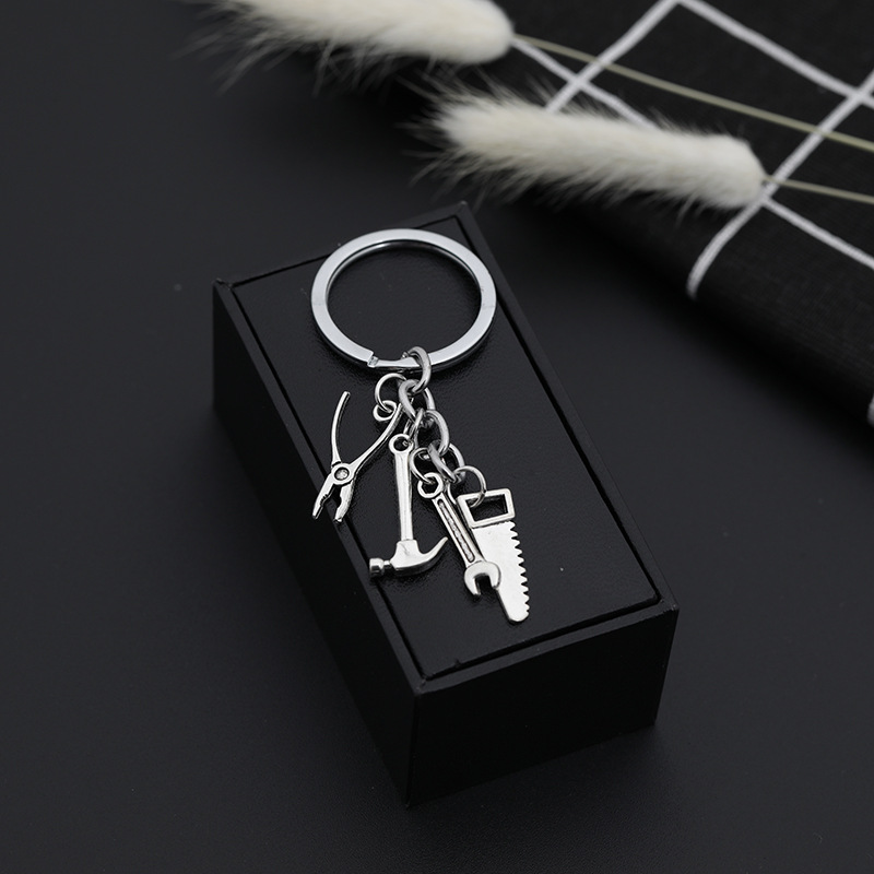 Explosion Keychain Personality Father's Day Gift Tool Four-piece Metal Keychain Pendant Jewelry Wholesale Nihaojewelry display picture 3