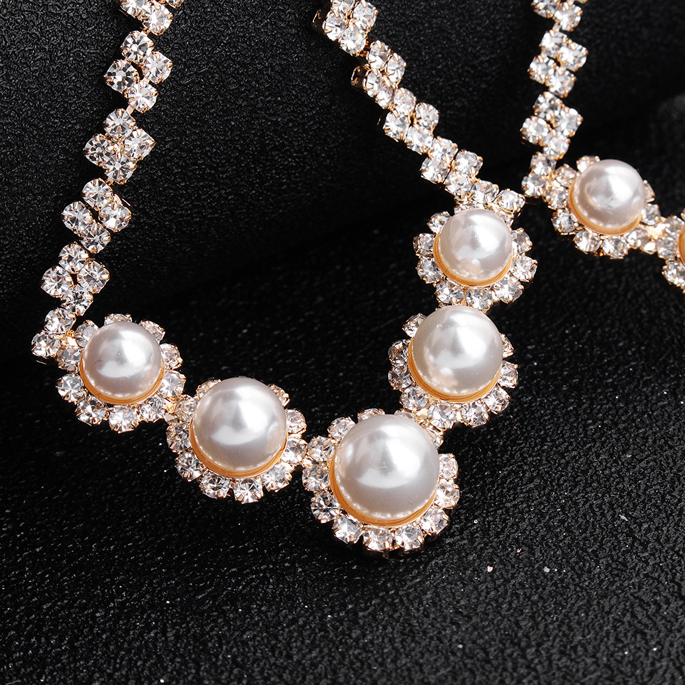 Fashion New Exaggerated Big-brand Trend Banquet Sexy Pearl Diamond Earrings display picture 5