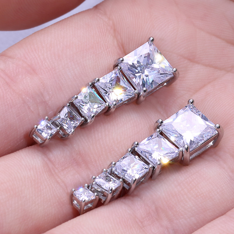 Classic Inlaid Four-claw Square Zircon Copper Earrings Wholesale display picture 2