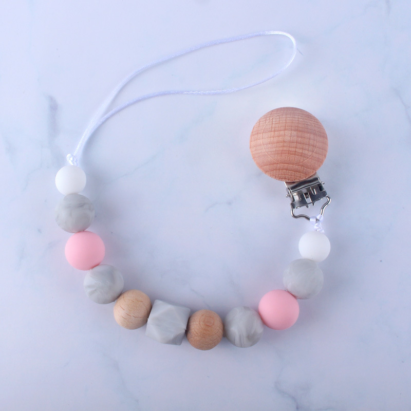 Bebé chupete anti-gota cadena bebé juguete de silicona chupete clip anti-gota banda Chew música anti-perdido cadena Nuevo