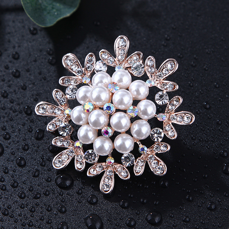 Spilla girasole con perle e strass oro rosa per donna_voghion.com