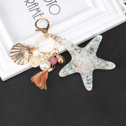 Factory direct supply European style new starfish keychain creative tassel car pendant alloy ladies bag pendant