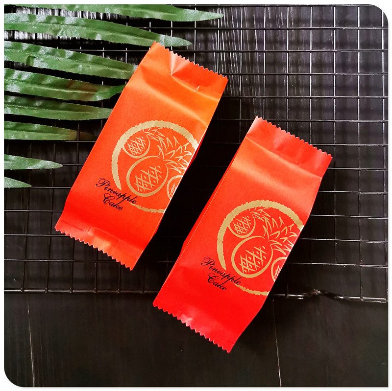 Nueva bolsa de embalaje crujiente de piña engrosada piña roja caja de embalaje crujiente Año Nuevo algodón festivo sello de la máquina de papel