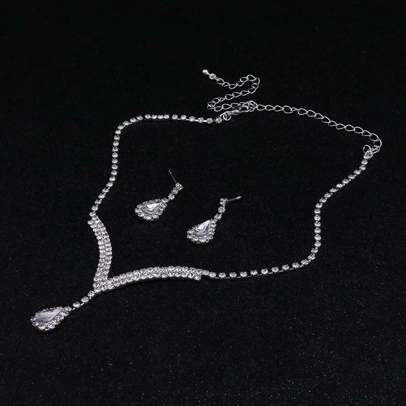 Designer-Stil, modisches Volldiamant-Halsketten-Ohrnagel-Set mit Tropfen-Anhänger und V-Ausschnitt_voghion.com