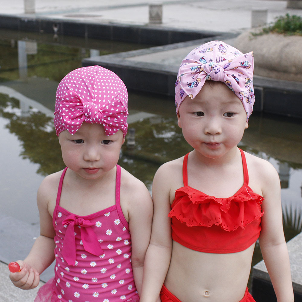 Children&#39;s Swimming Cap Bowknot Hat Good Elasticity Solid Color Printing Baby Swimming Cap display picture 17