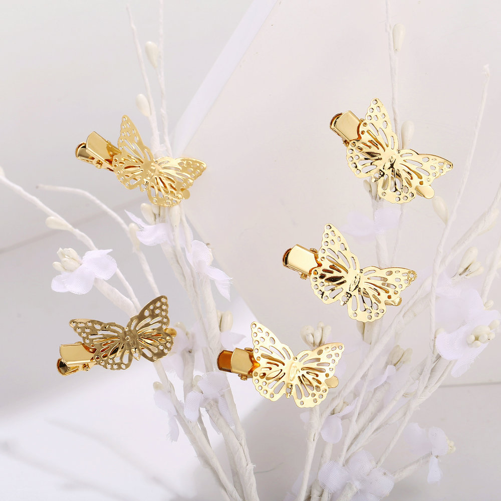 Europäische Und Amerikanische Grenz Überschreitende Mode Retro Hohle Goldene Schmetterlings Haars Pange Kreative Einfache Seiten Clip Weibliche Aoso Gleiche Haarnadel display picture 4
