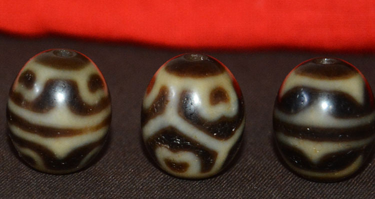 莲花虎牙天珠介绍,莲花达洛天珠,六瓣莲花天珠寓意_大山谷图库