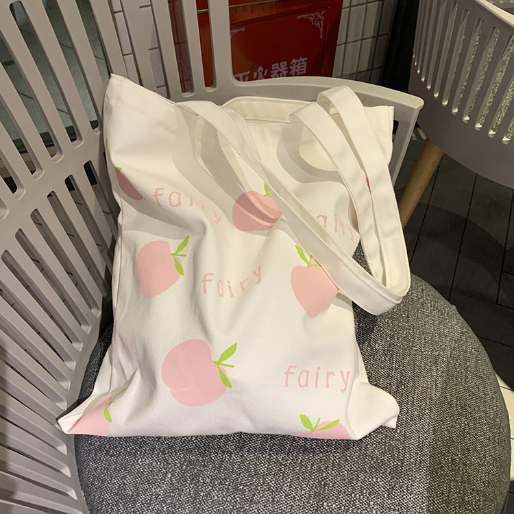 Nuevo estilo de lona fresca bolsa de hombro de las mujeres ins artístico todo partido casual bolsa de tela simple entrega de una pieza de las mujeres