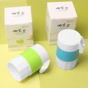 Four‑function pillbox — tablet cutter, grinder and storage, 6.3×3.7 cm, white+green or white+blue