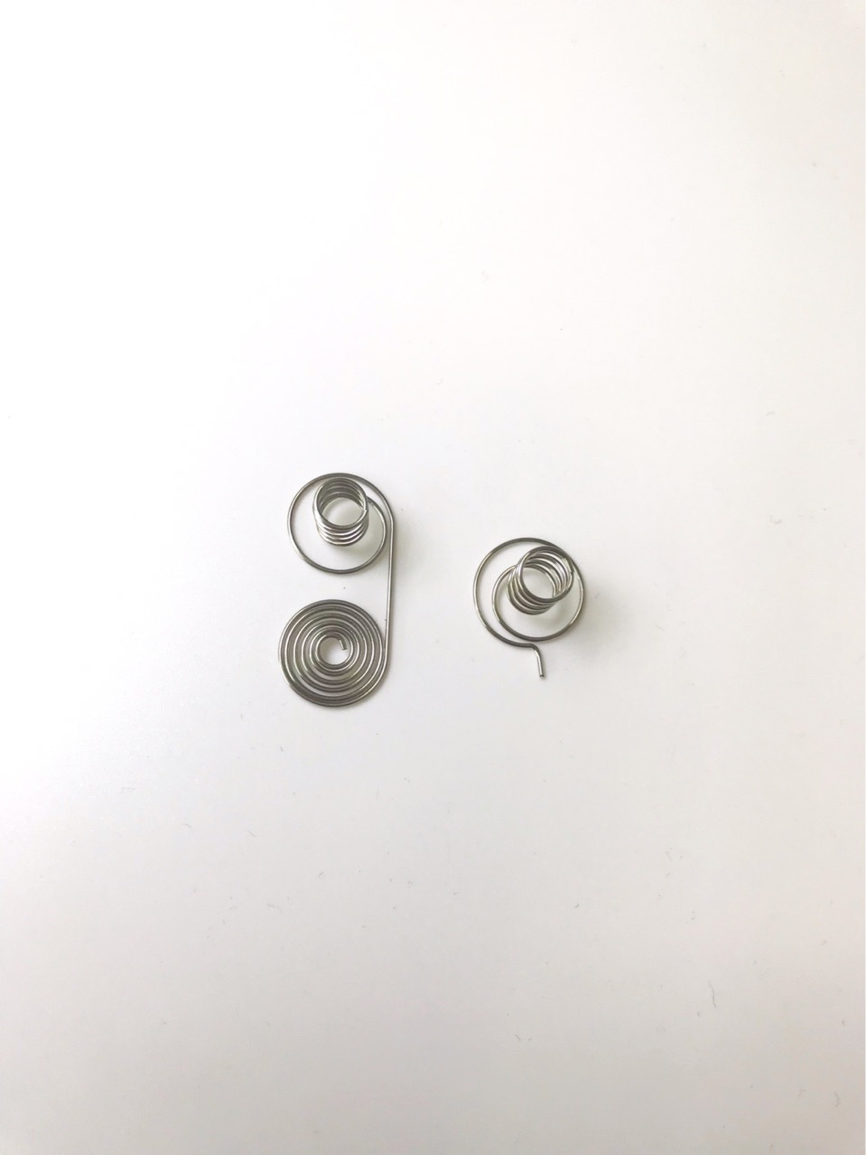 






 定制按键接触弹簧材质304不锈钢电池摇控器弹簧