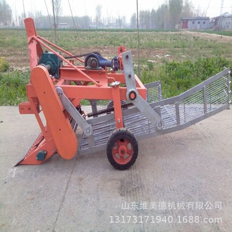 热销12马力手扶拖拉机带花生收获机 适用宽幅55-80厘米两行起垄机